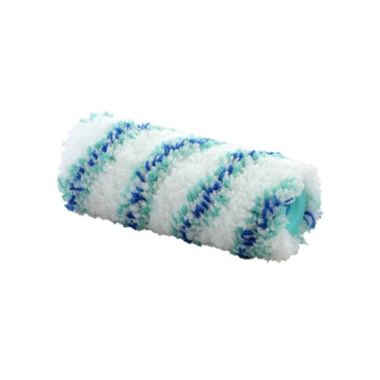Roll of white fabric with blue and green yarn on a white background