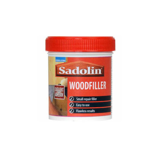 Jar of Sadolin woodfiller with red lid on a white background